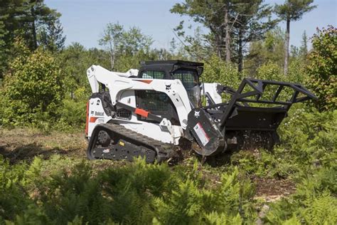 bobcat with brush clearing attachment